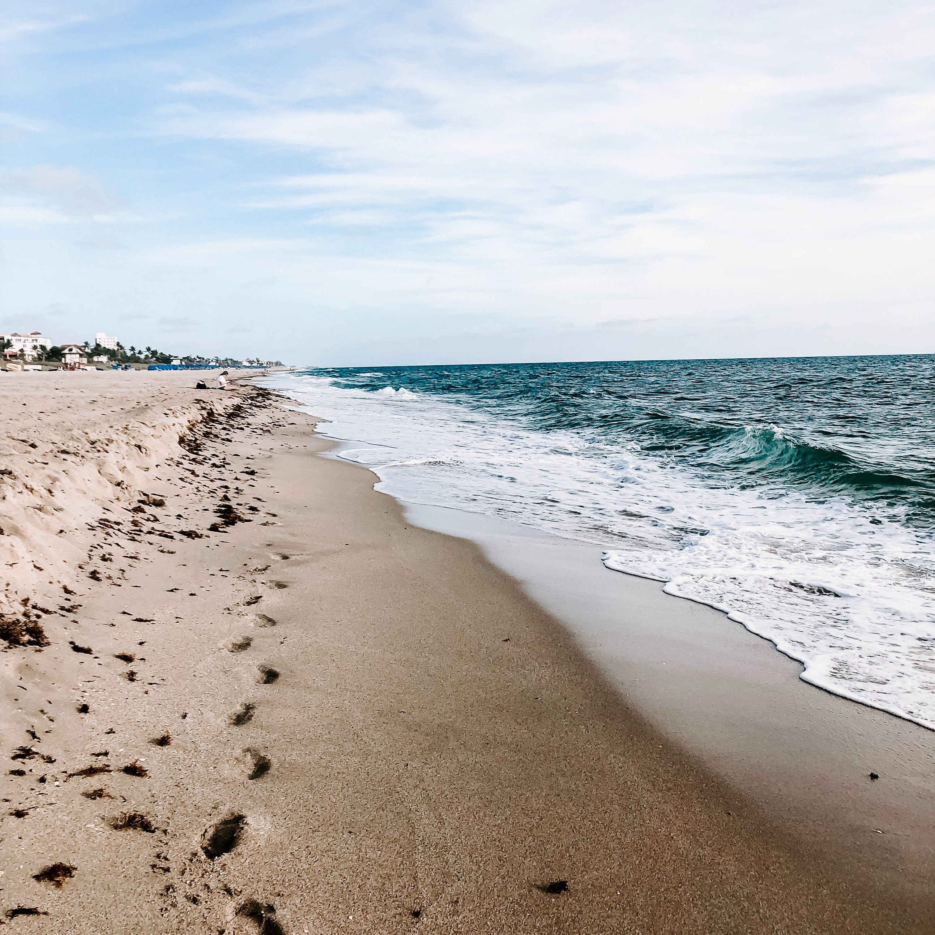 No spot in Florida is far from water. Shop moisture resistant bathroom partitions in Jacksonville, Florida with Partition Plus. Photograph of orange sunrise over Jacksonville, Florida beach, with waves.