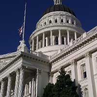 Photograph of large white Sacramento, California capitol building, classical architecture.