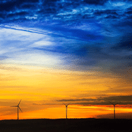 Stainless steel partitions are environmentally friendly. Photograph of vibrant sunset, blue and orange.