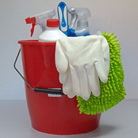 Clean Stainless Steel regularly to keep it looking great. Photograph of a bucket of cleaning supplies.