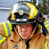 Resistance to fire is an important benefit of stainless. Photograph of female firefighter.
