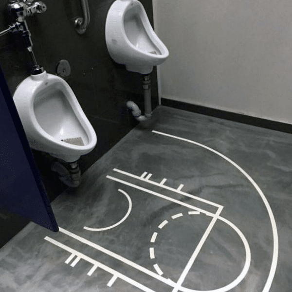 Urinals with Basketball Court Markings around the base using the urinal as the basket