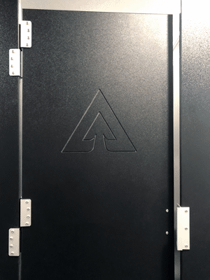 Solid plastic toilet partitions with custom engraving. Engraved solid plastic toilet partitions