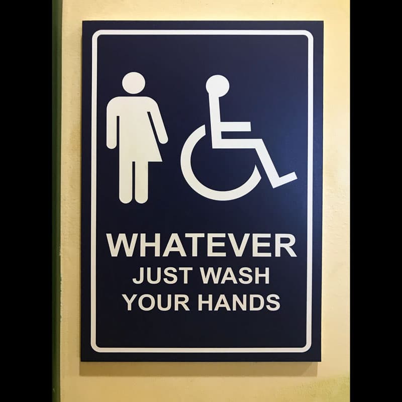 Photo of "Whatever Just Wash Your Hands" sign.