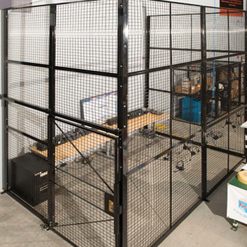 Photograph of partitioned space within a warehouse using BeastWire mesh guarding. Includes locking door.