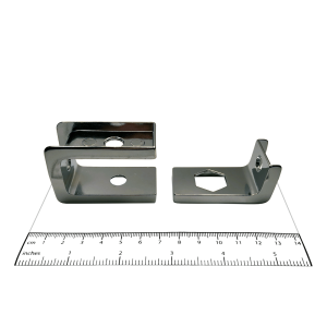 Photograph of notch flanges from Bobrick In-Swing Door Hardware Kit - 1002038, with ruler.