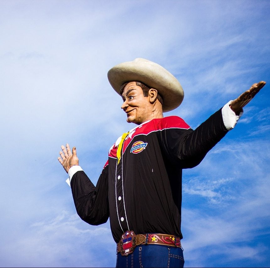Photograph of cowboy statue near entrance to Dallas, Texas fair.