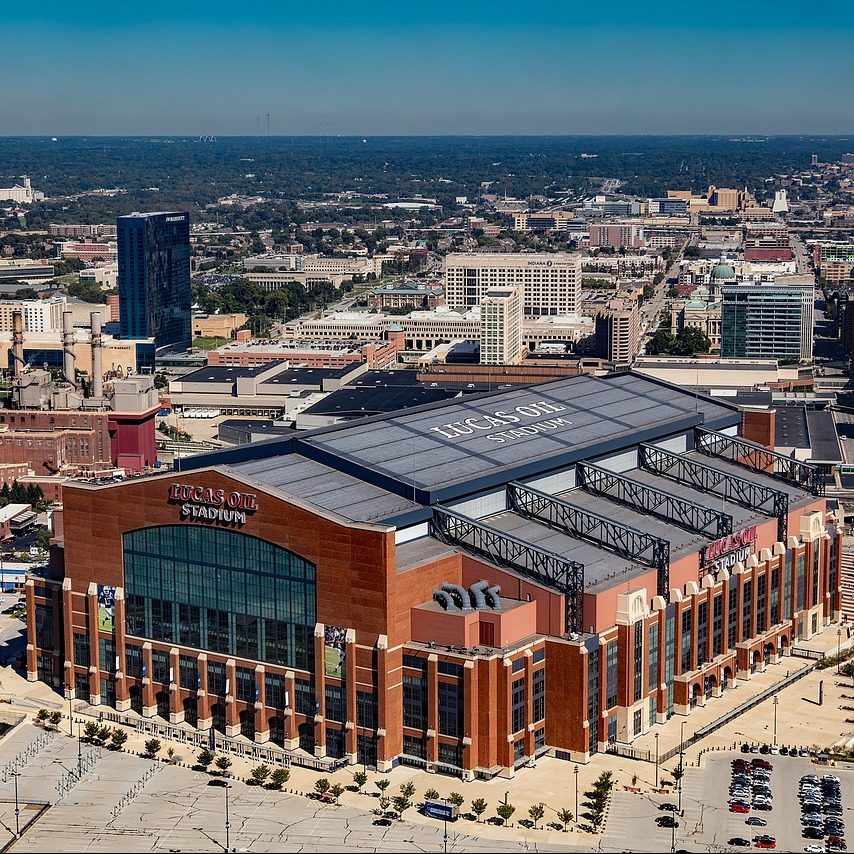 Aerial photograph of covered stadium in Indianapolis, Indiana.