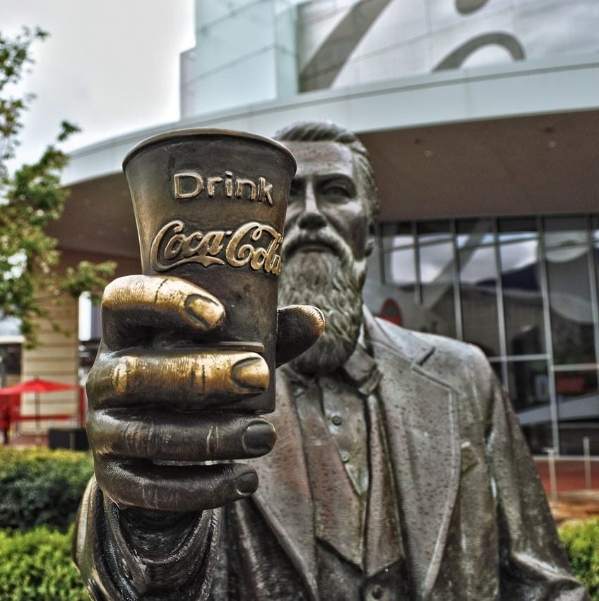 Atlanta, Georgia is home to the Coca Cola Company headquarters. Partition Plus is your headquarters for bathroom stalls in Atlanta, Georgia. Photograph of bronze statue of Coca Cola inventor, Atlanta, Georgia.